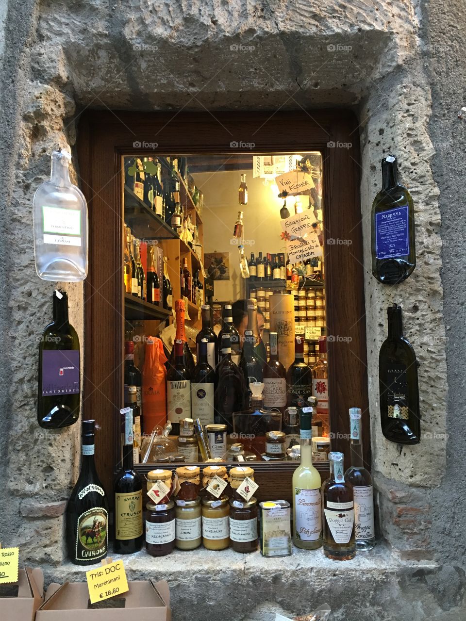 Window of wine shop in pitigliano of italy