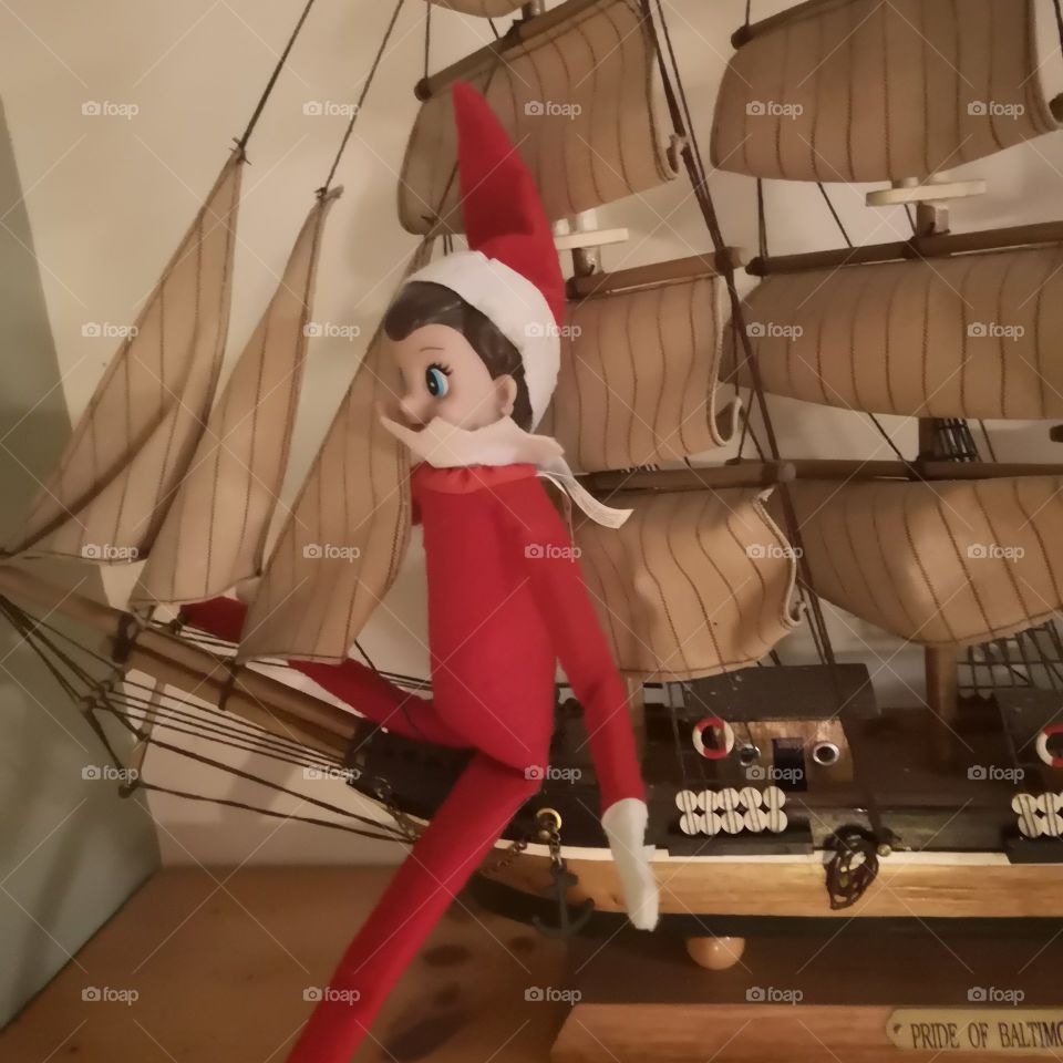 Elf Sailing a Boat