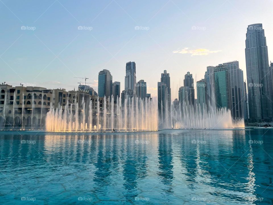 The picture shows the beauty of fountain show in Dubai Mall. This is the first evening show - beginning of evening is very promising, what will person behind camera see next?