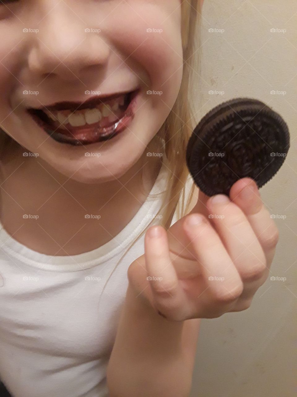Smiling Gurl Holding Oreo Cookie