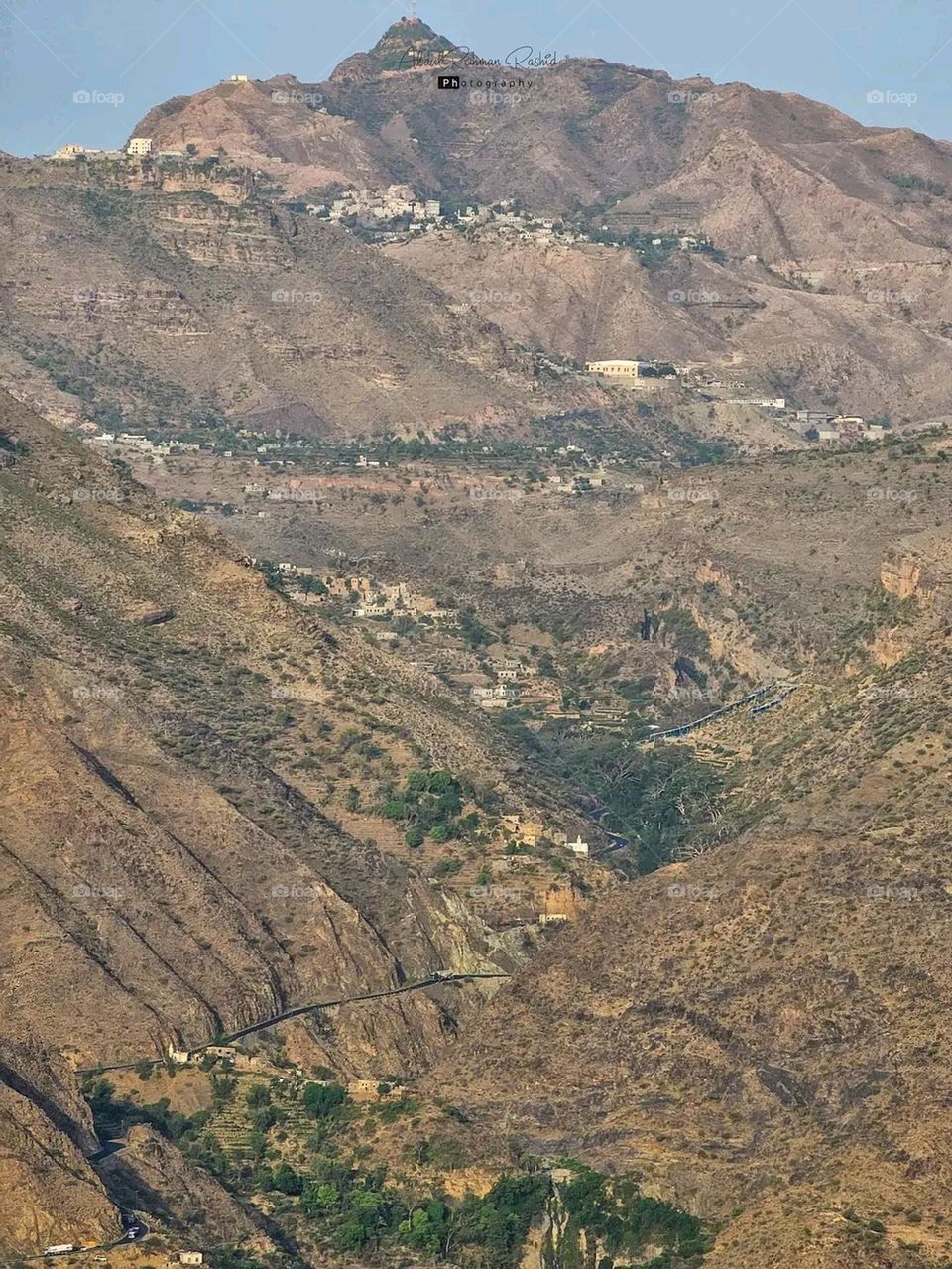 Glory be to God, the magnificent and picturesque view and the natural green trees are a view that is nothing more wonderful than it
