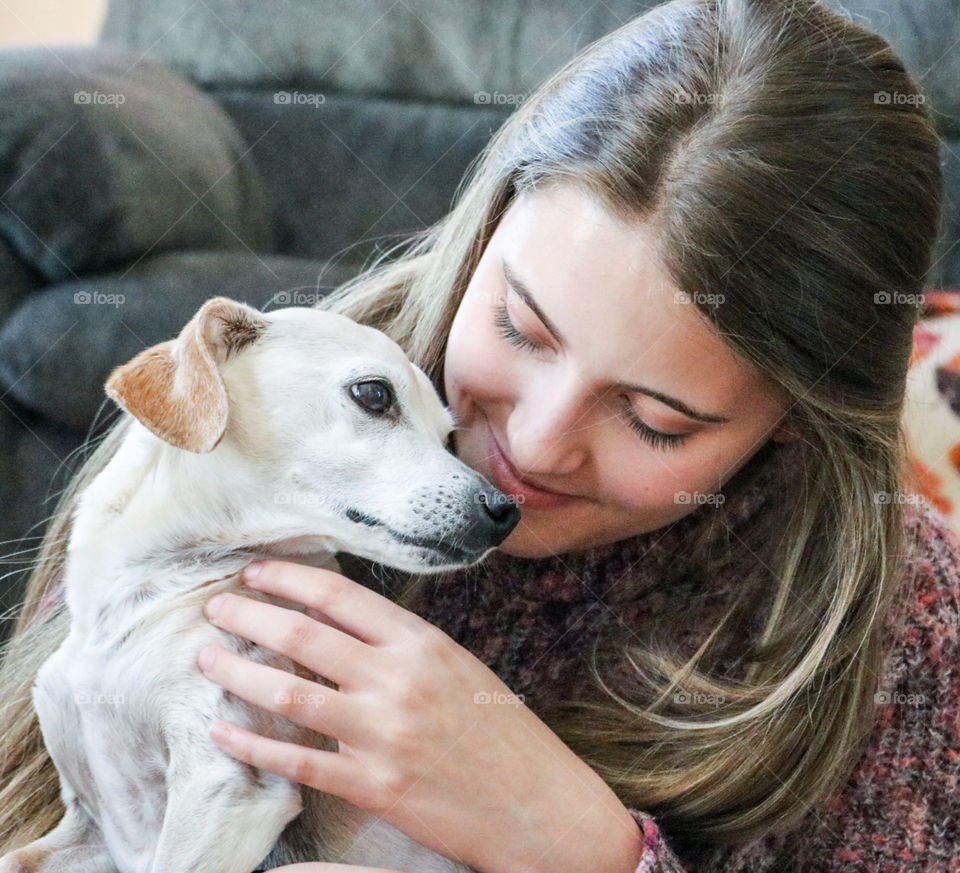 Honey - our family pet and daughter being affectionate. 