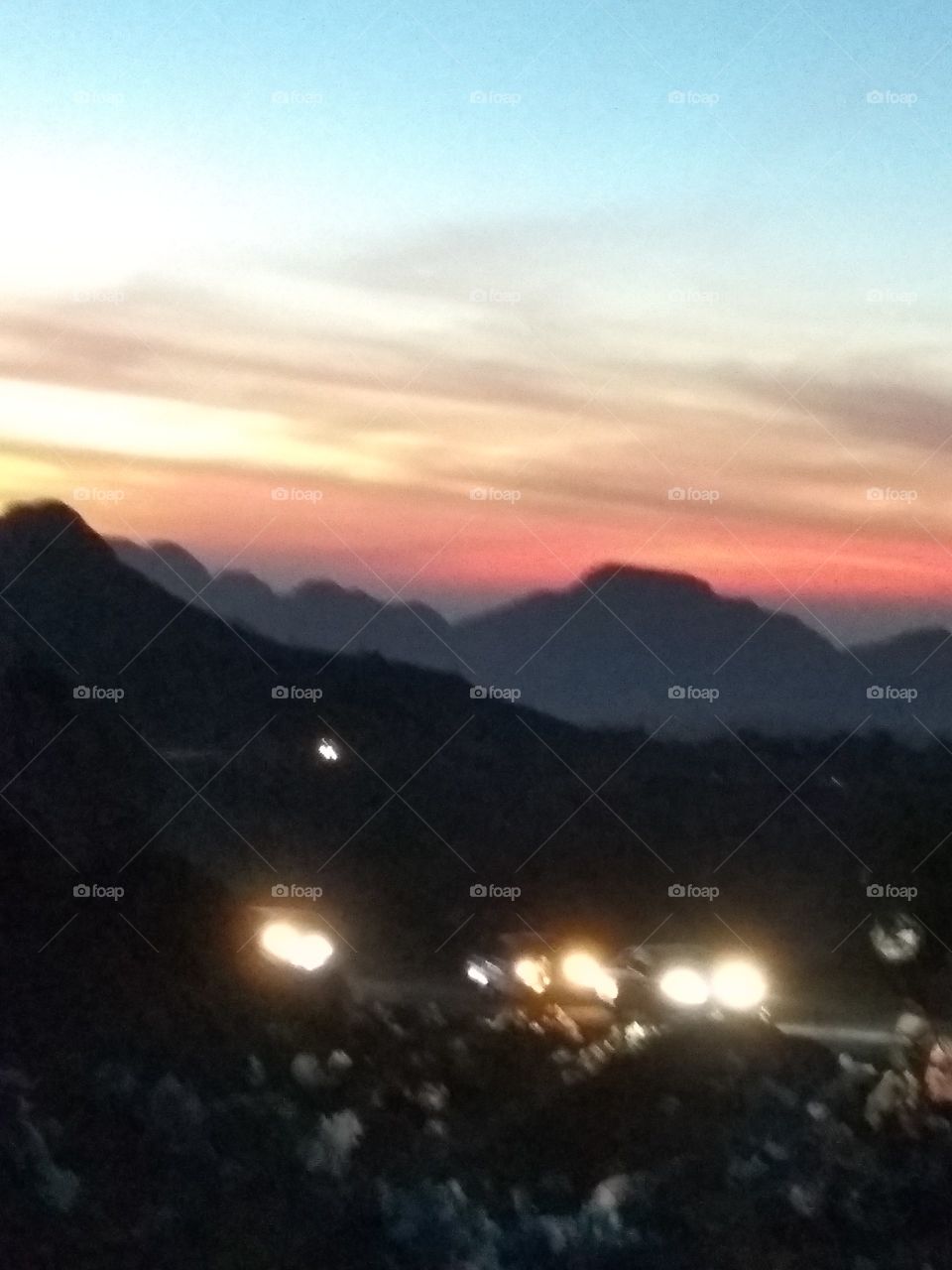 Gloaming,mountains and car lights