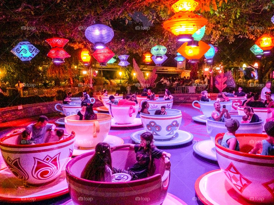 The Mad Hatter's Spinning Tea Cups at Disneyland. Hang on, things are beginning to spin out of control. 