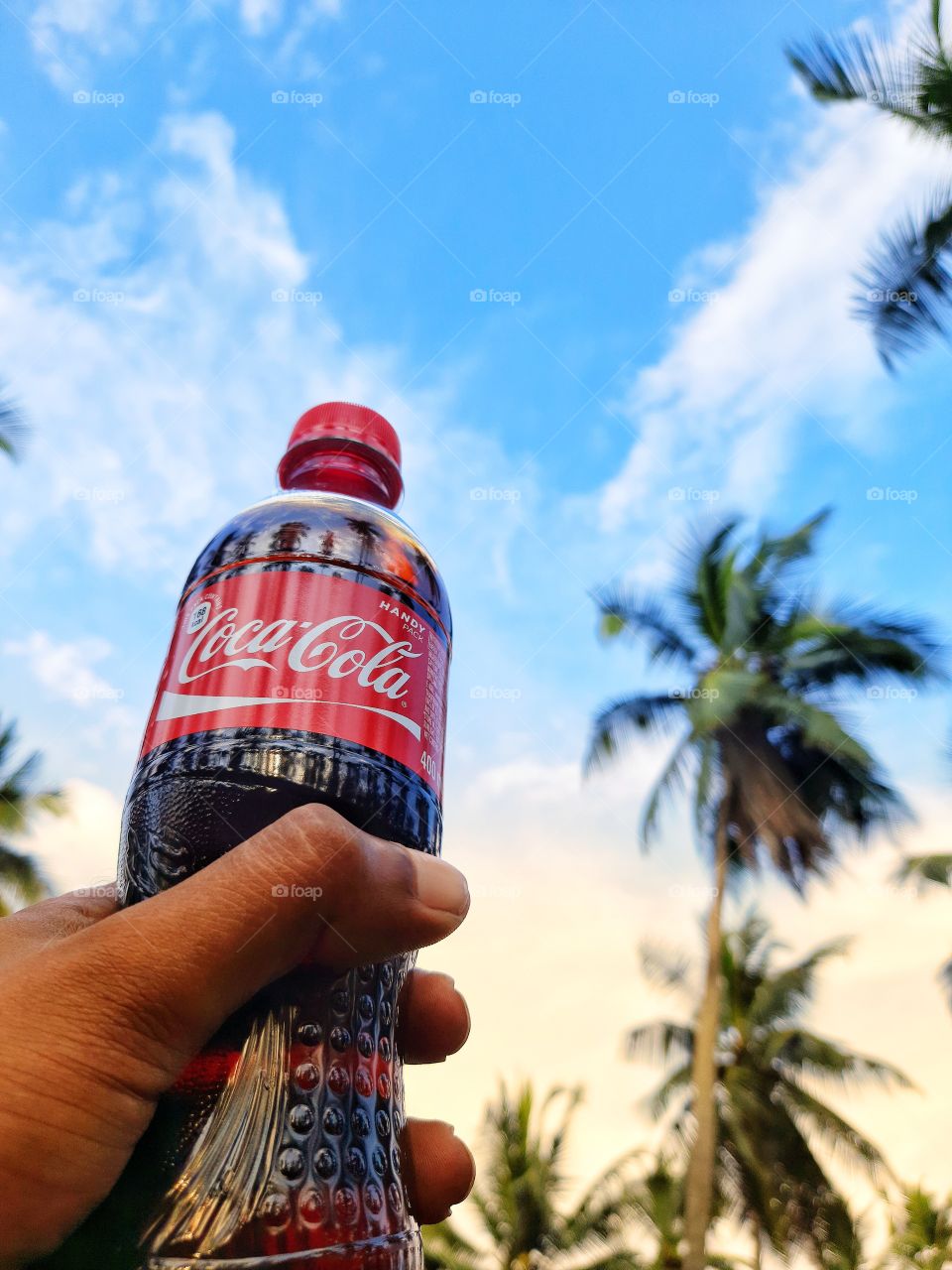 Blue sky with Coca-Cola