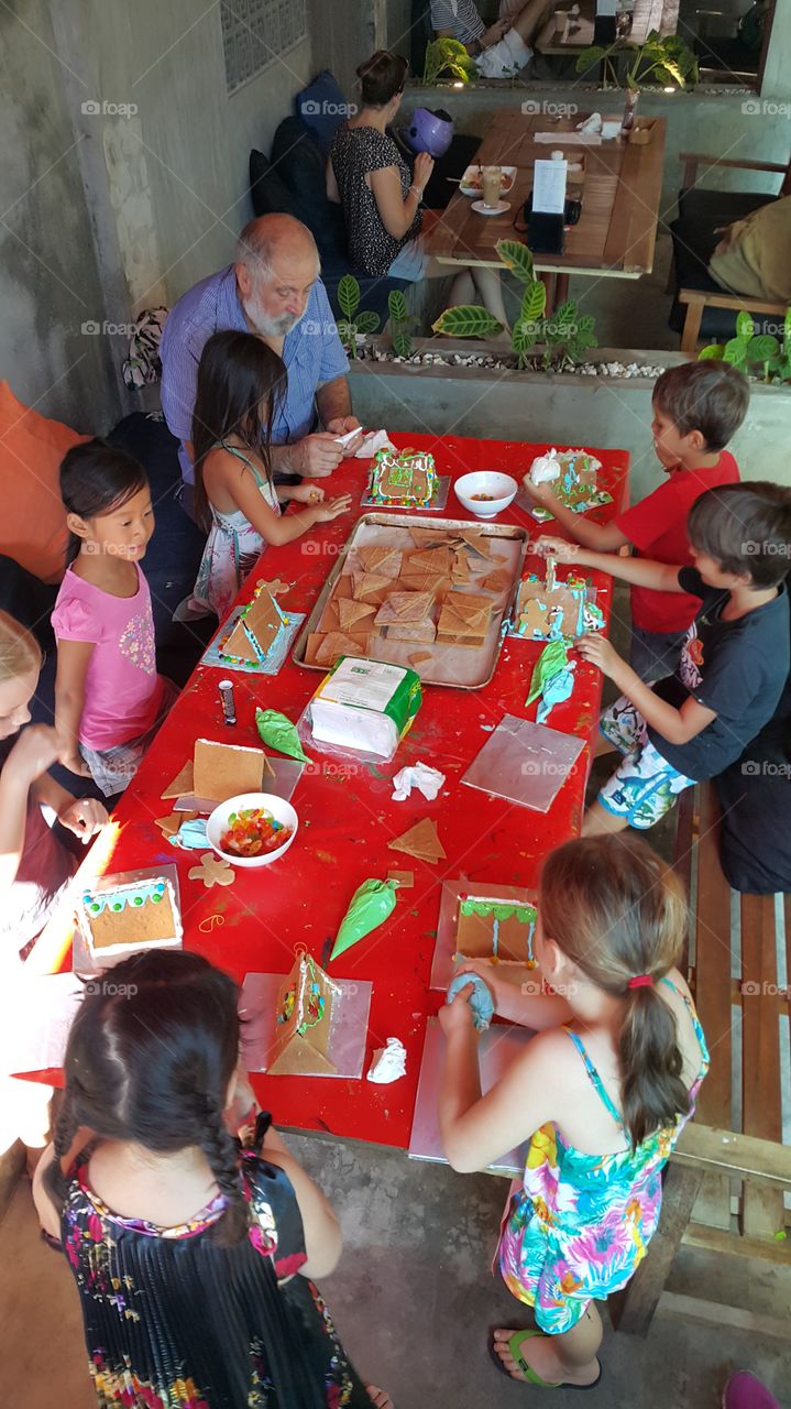 kids preparing Christmas Ginger bread house