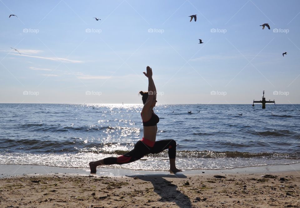 Yoga at the Baltic Sea coast in Poland 