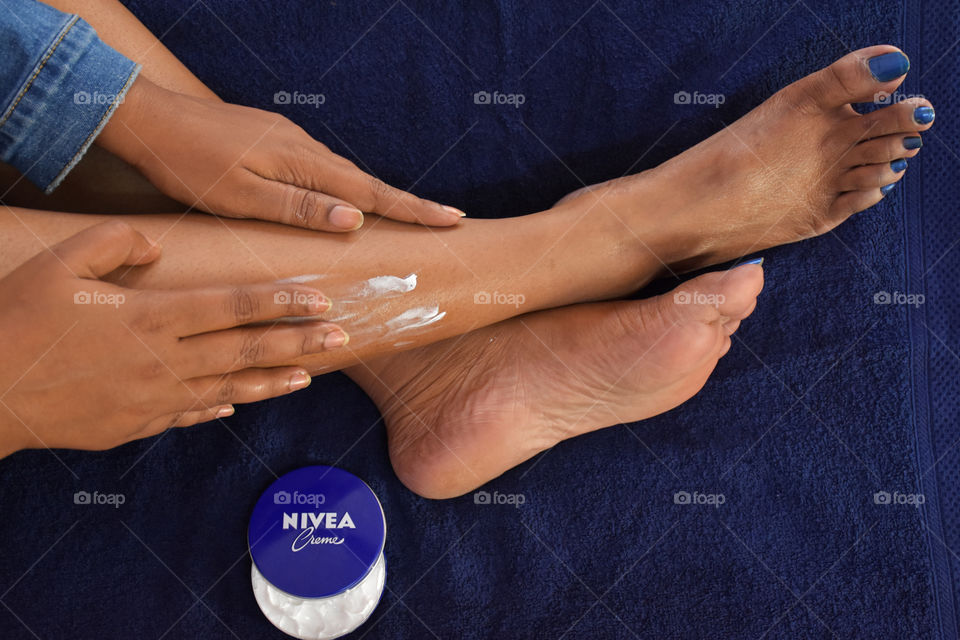applying nivea cream