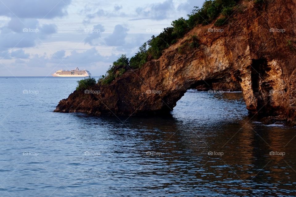 Lover's rock, Castries, St. Lucia, with cruise ship in the background