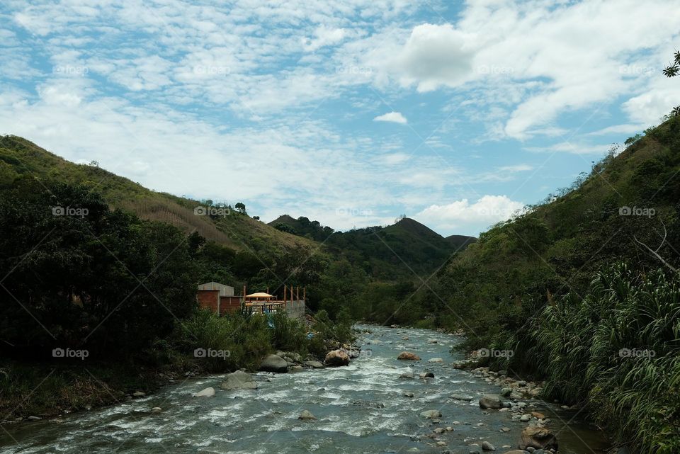 Flowing river between the mountains