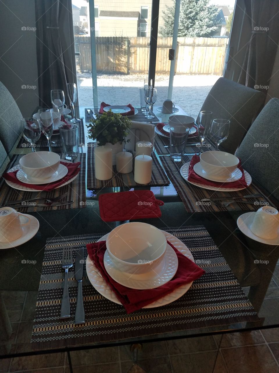 Place setting on glass dinning table