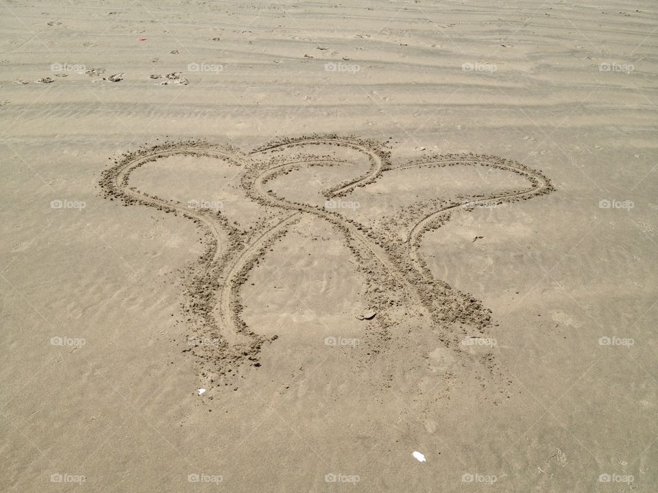 Heart in the Sand. Two hearts I drew in the sand to represent my wife and my love for one another.