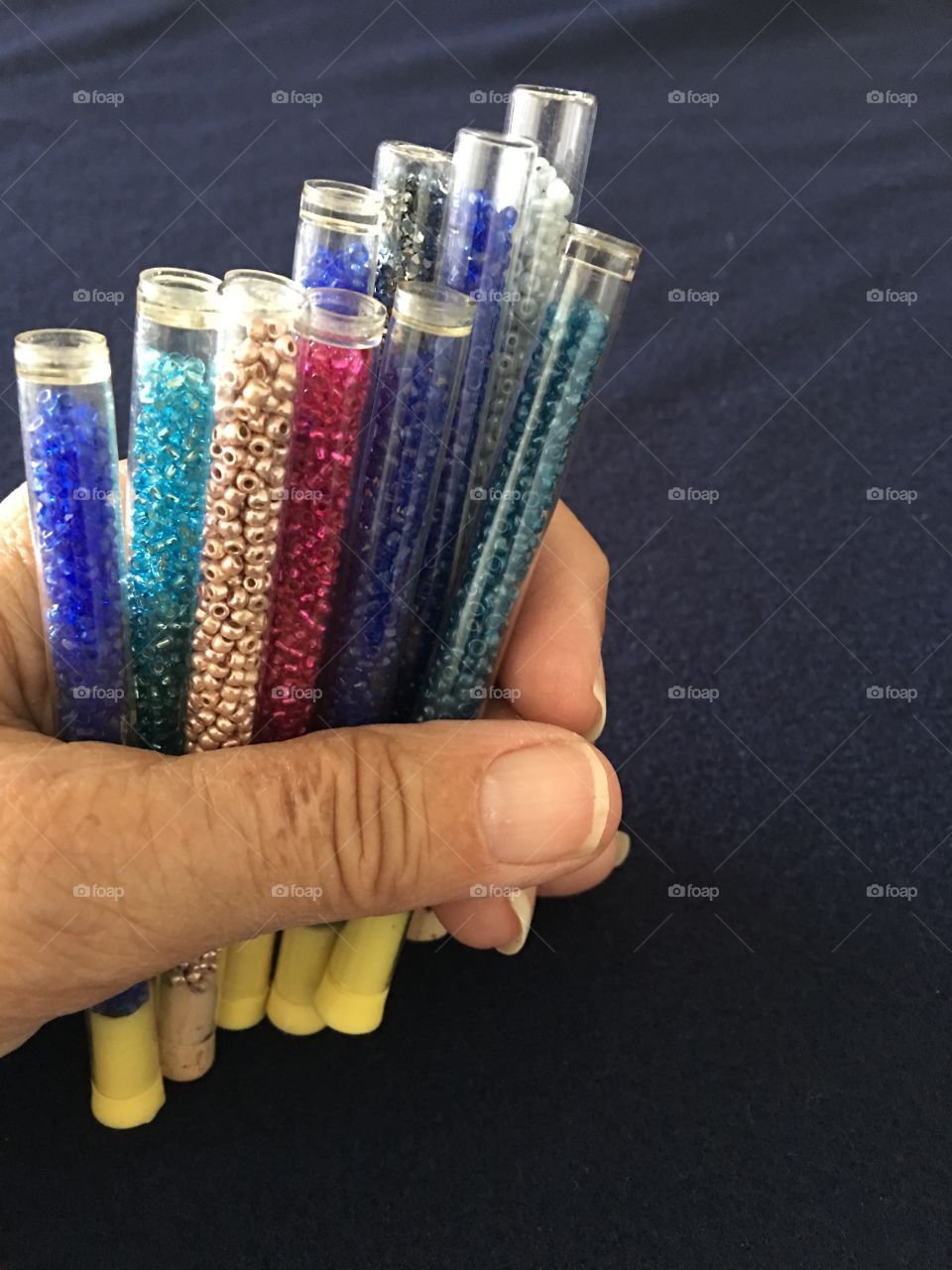 Handful of bead containers 