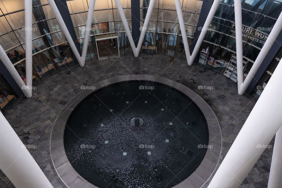 fountain in the center of a building