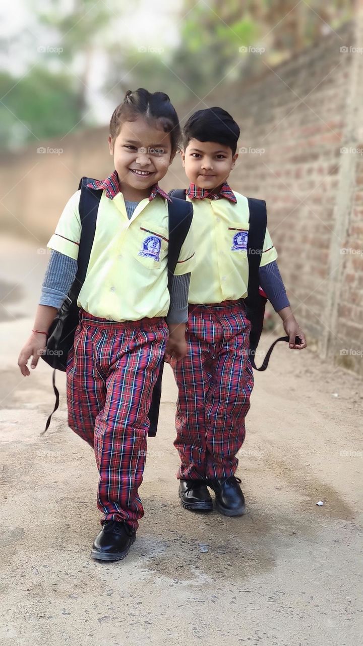 two kids 1st day school going