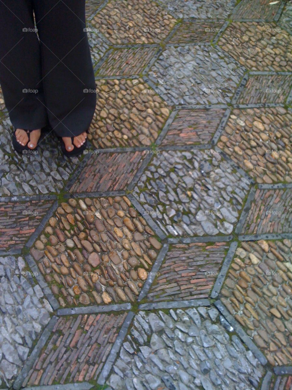walking on pebble pathway in interesting shapes and colors