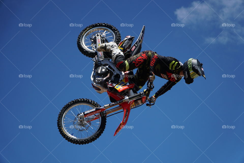Stunt rider performing on a motorcycle