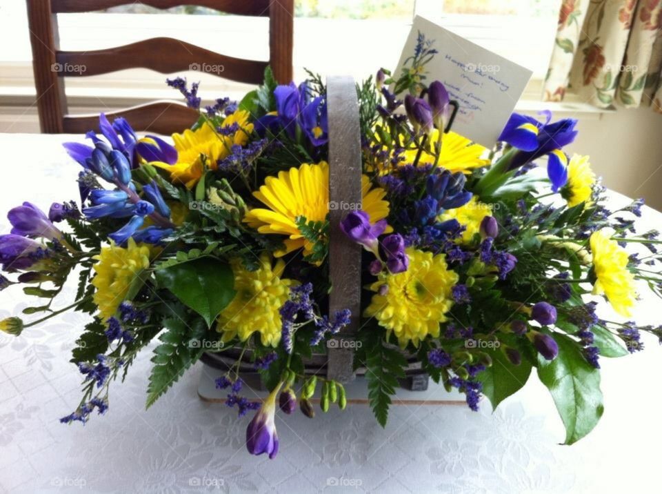Purple and yellow floral arrangement 