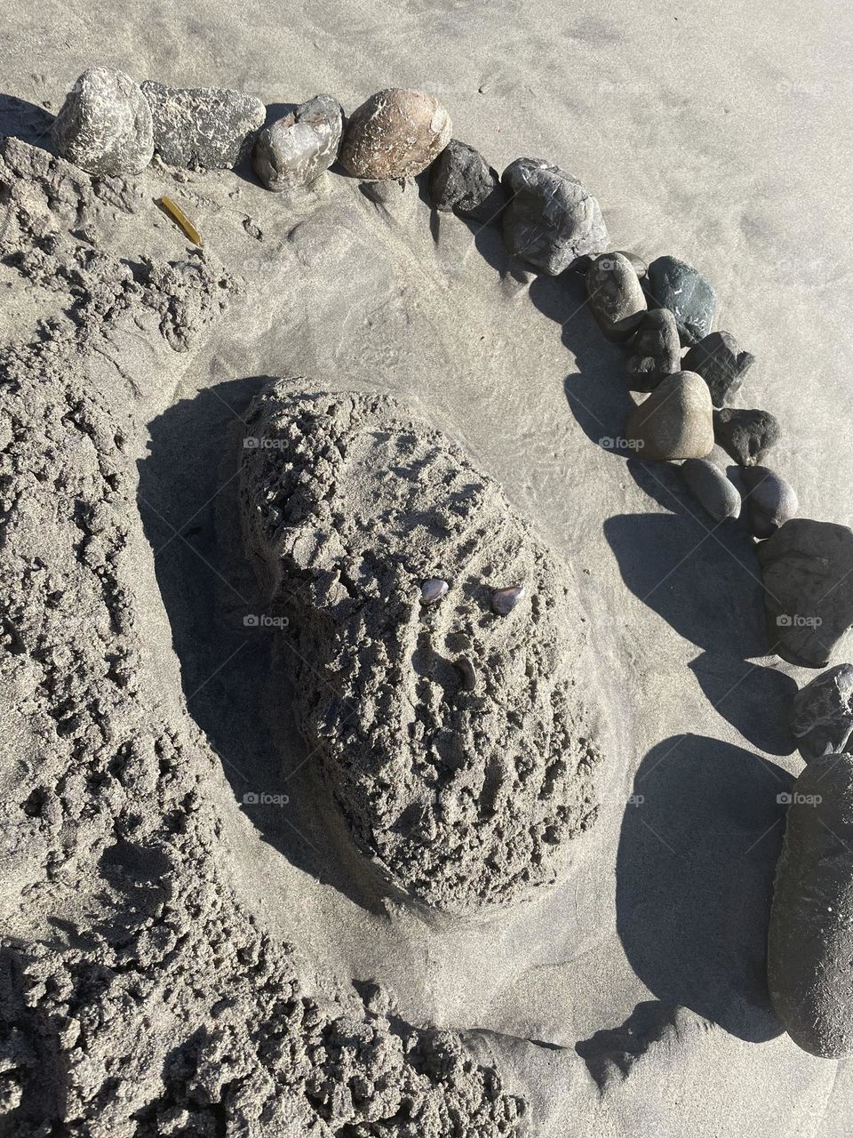 It was unnamed Sand castle the kids were building in the pfeiffer beach.. liked their idea so took a pic of it