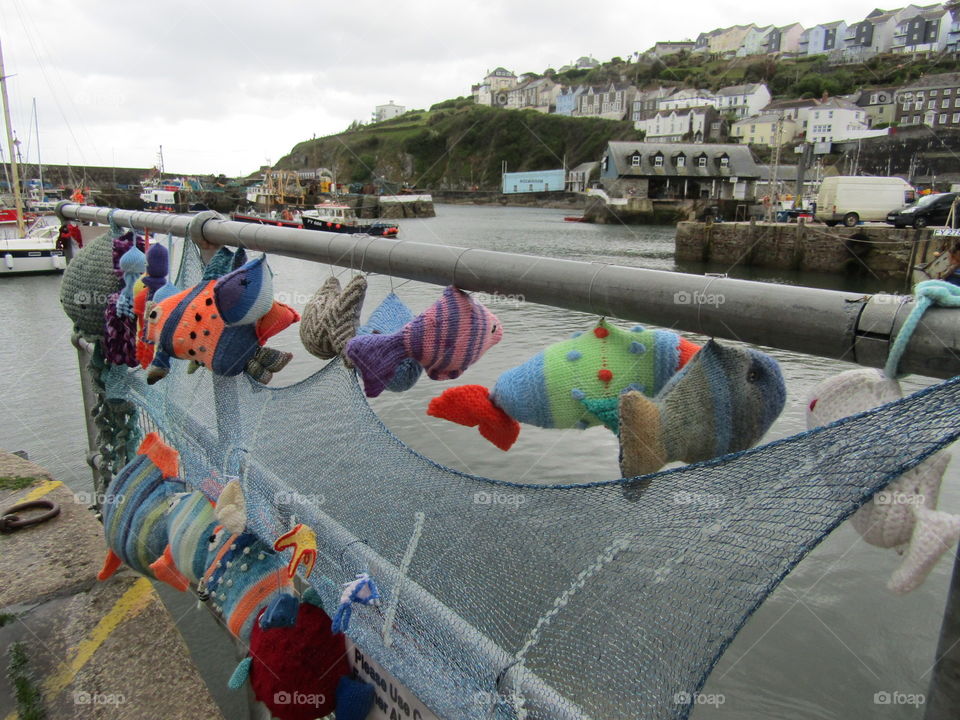 Knitted fish overlooking Mevagissey (cornwall)