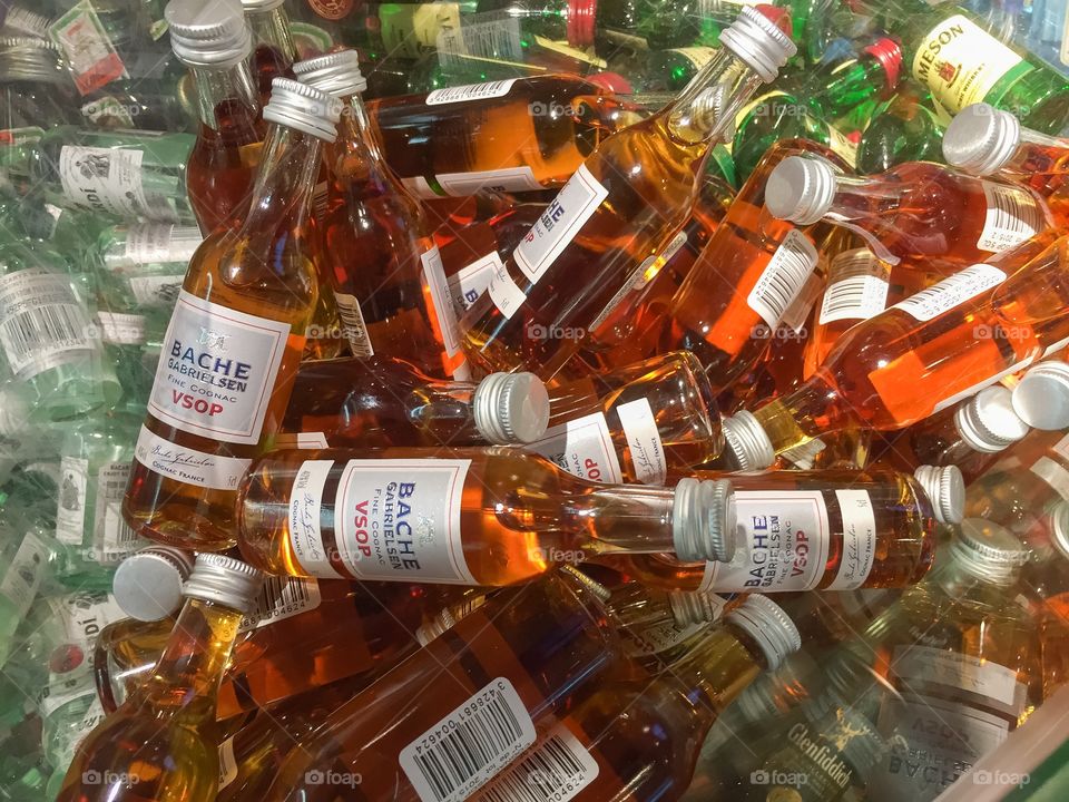 Smal bottles of Cognac at a taxfree shop at copenhagen airport in Denmark.