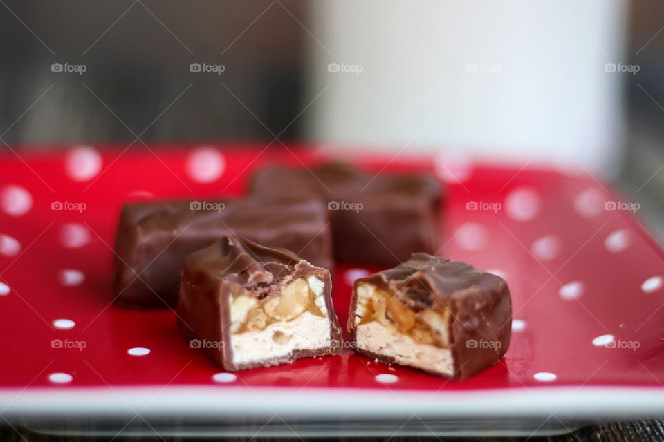 Snickers chocolate bar on plate