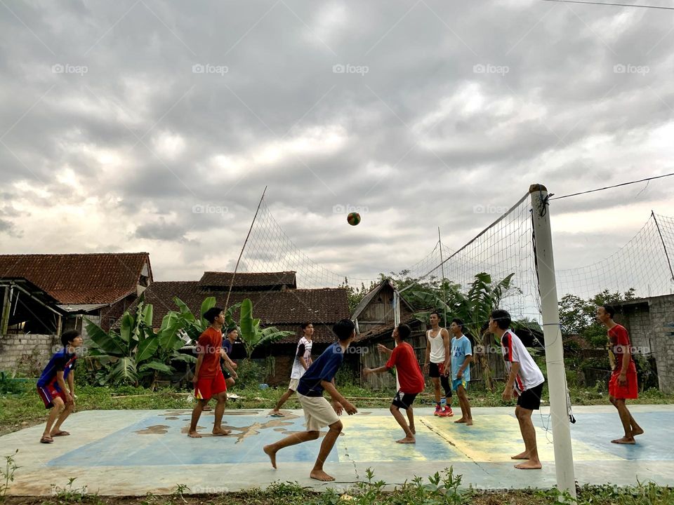 play volleyball