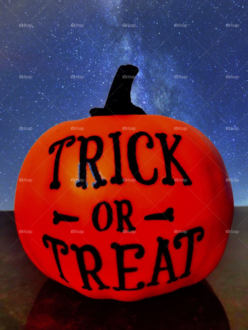 Trick or treat! Pumpkin against a spooky sky. 