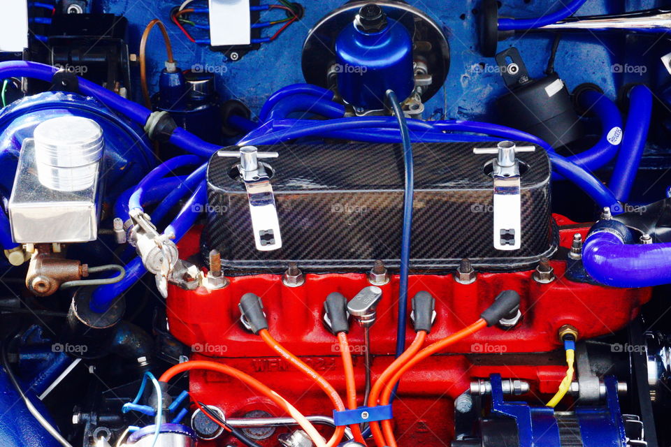 Mini engine red and blue. Brighton mini car show