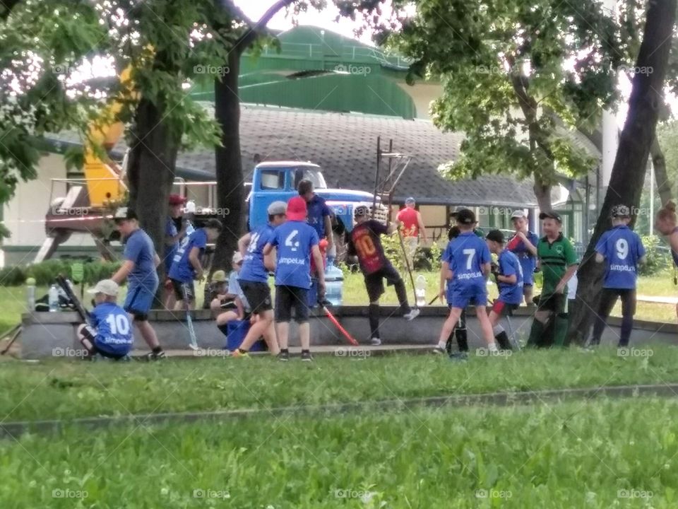 children sport time in the city park training