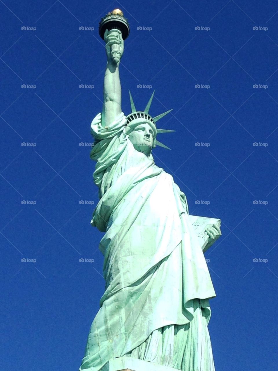 Statue of Liberty. Statue of Liberty with bright clear blue sky from Liberty Island