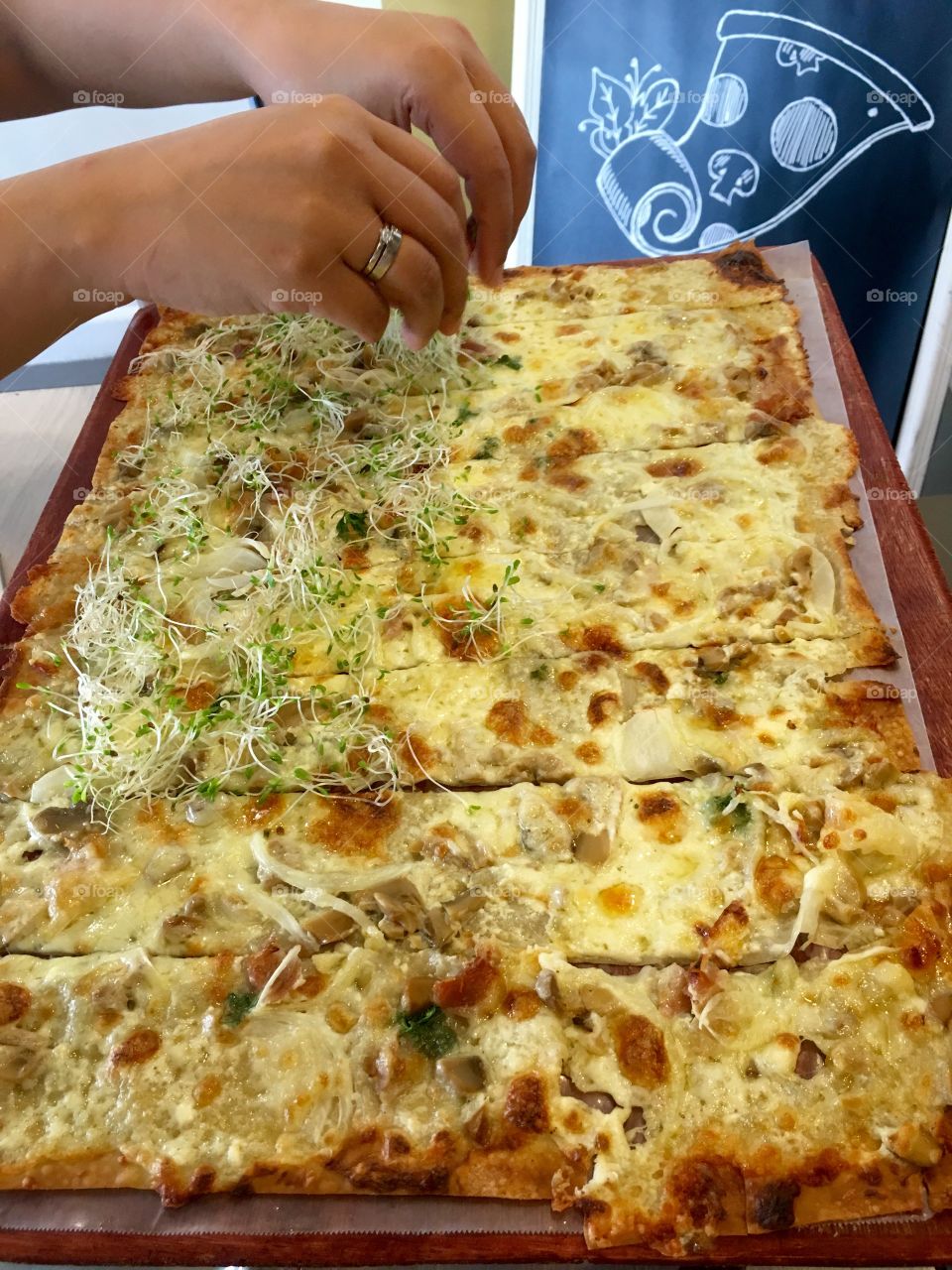 preparing a pizza meal 