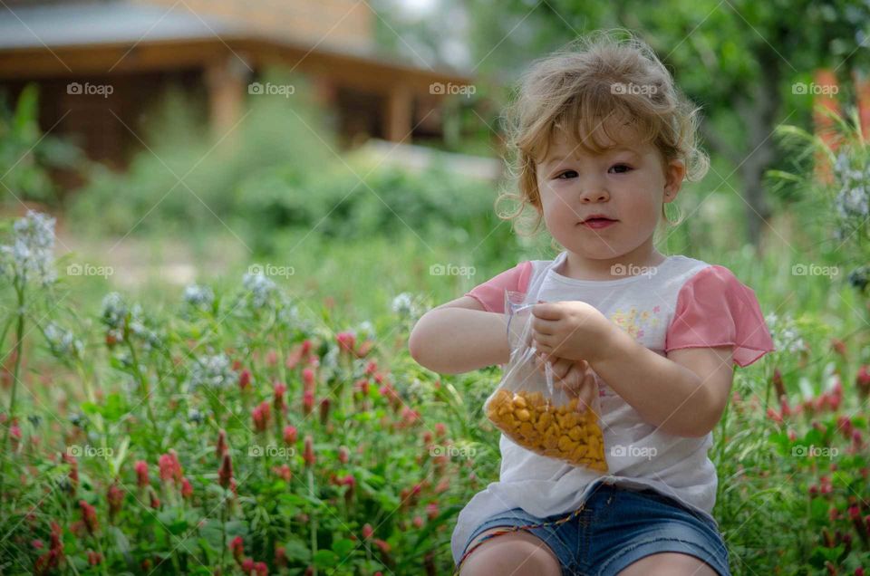 Portrait of a girl holding cookies