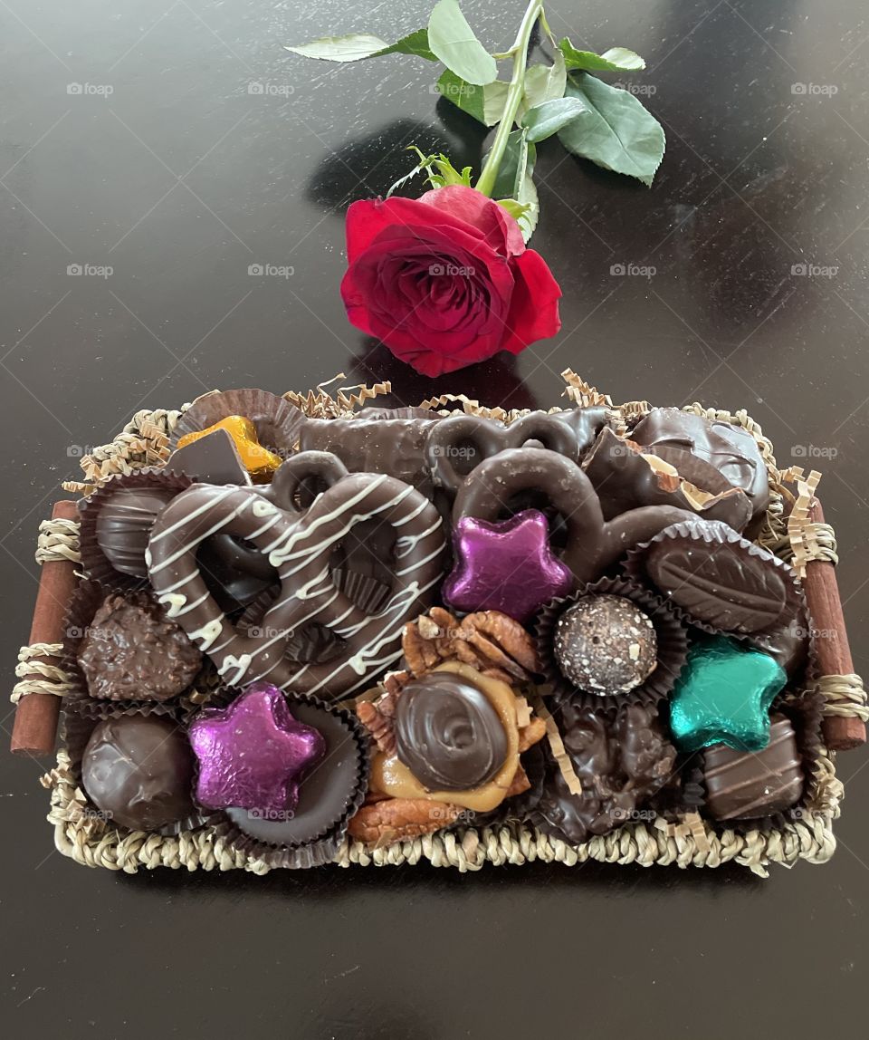 Chocolate platter and a red rose