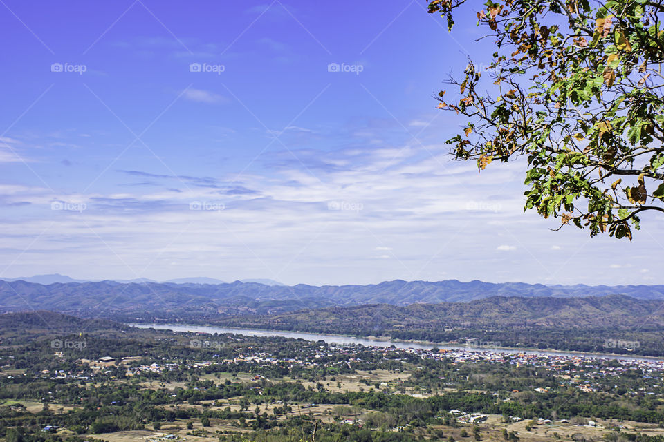 Cityscape chiangkhan along the Mekong River and mountain view point at Phu Thok , Loei in Thailand.