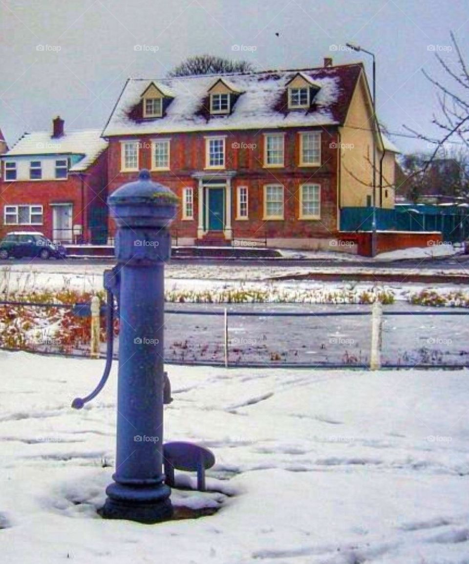 The old water pump at the local pond