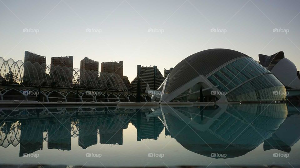 City#buildings#reflect#water#sunset