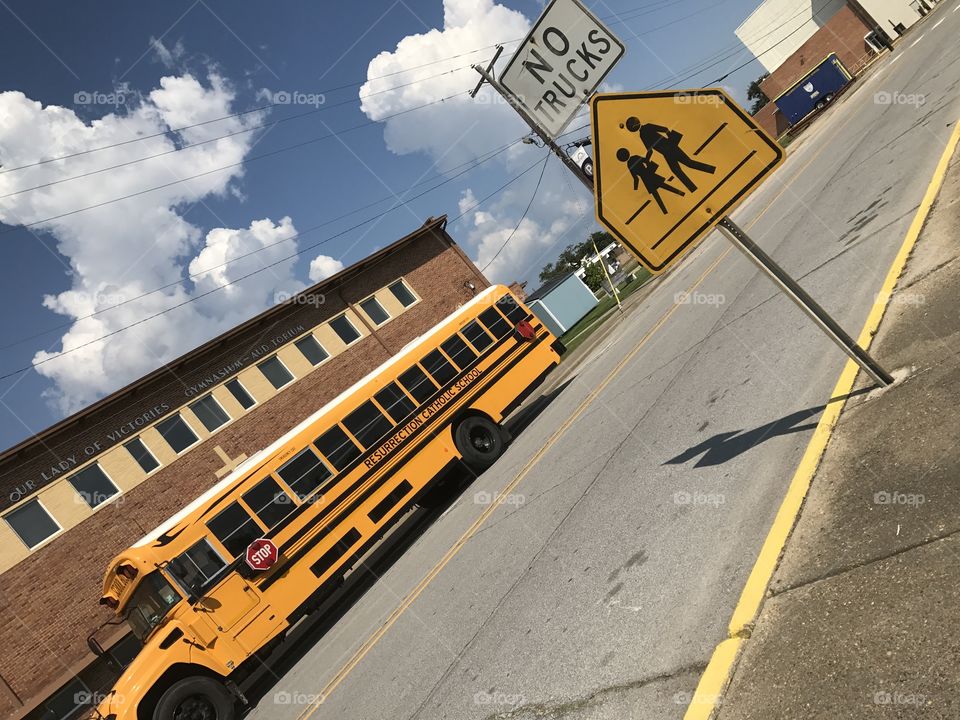 School bus and street sign!