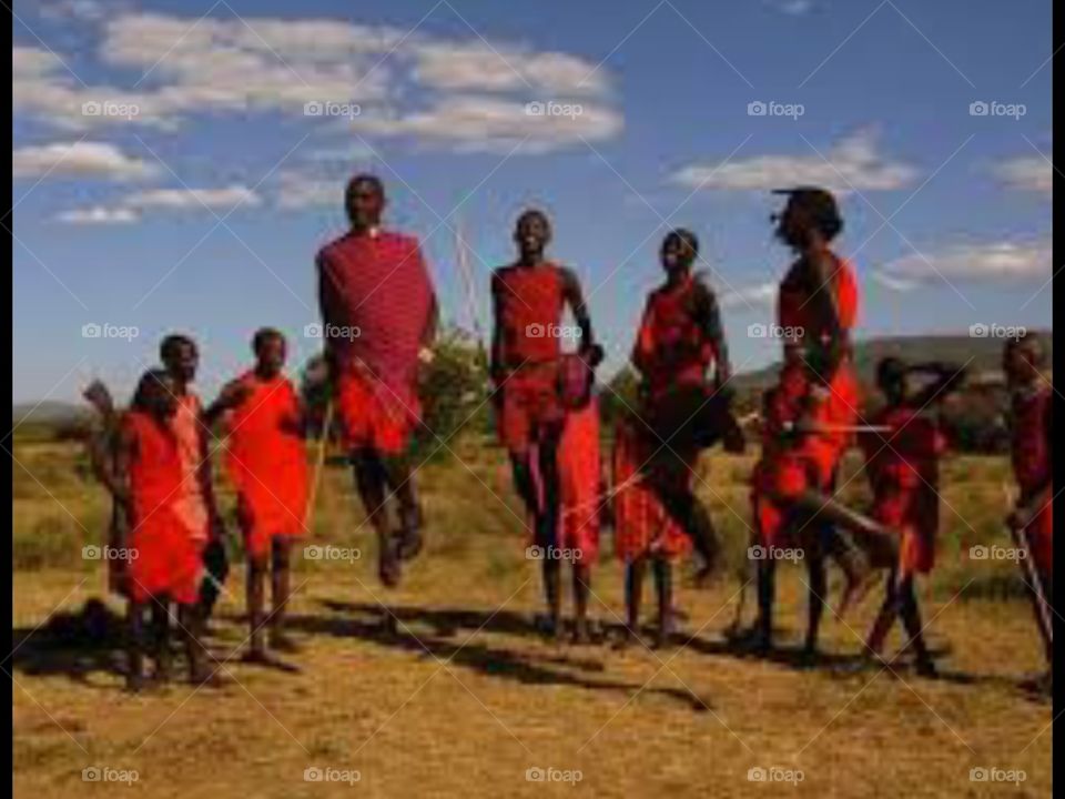 the friendly aggresive and beautifull people of masai mara kenya one man can hunt down a single lion so strong and alsk high jumpers upto 1.8 feet high from floor