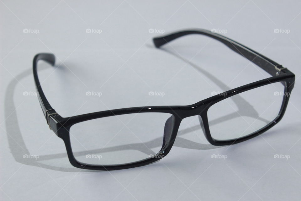 Glasses with black frame.