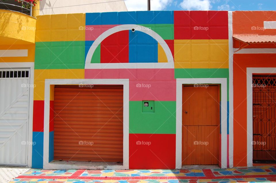 Coloured squares in the wall . 