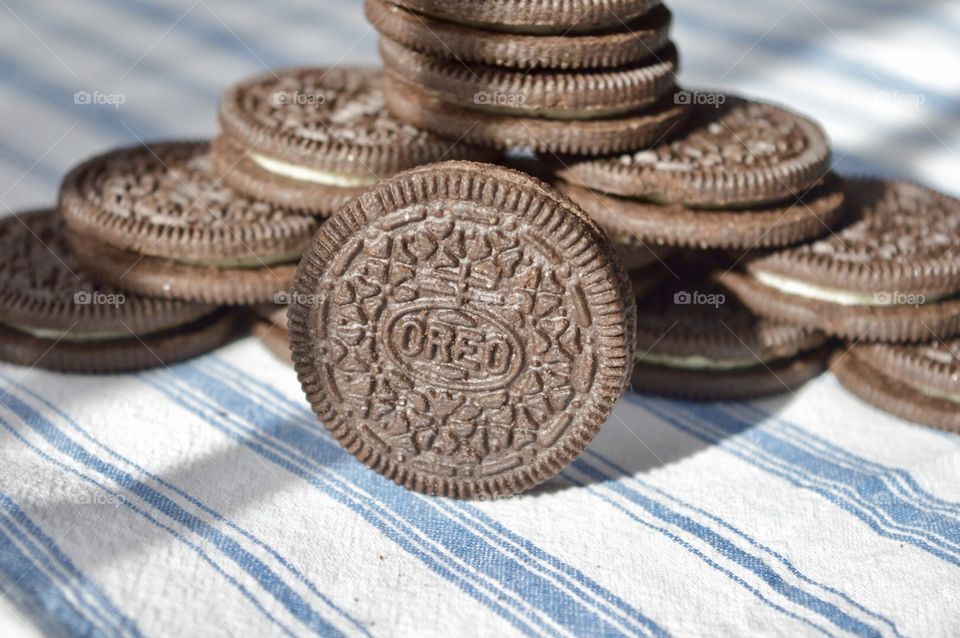 Oreo cookies on a blue striped background 