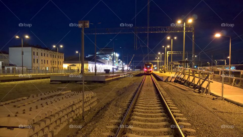Railway station at night.