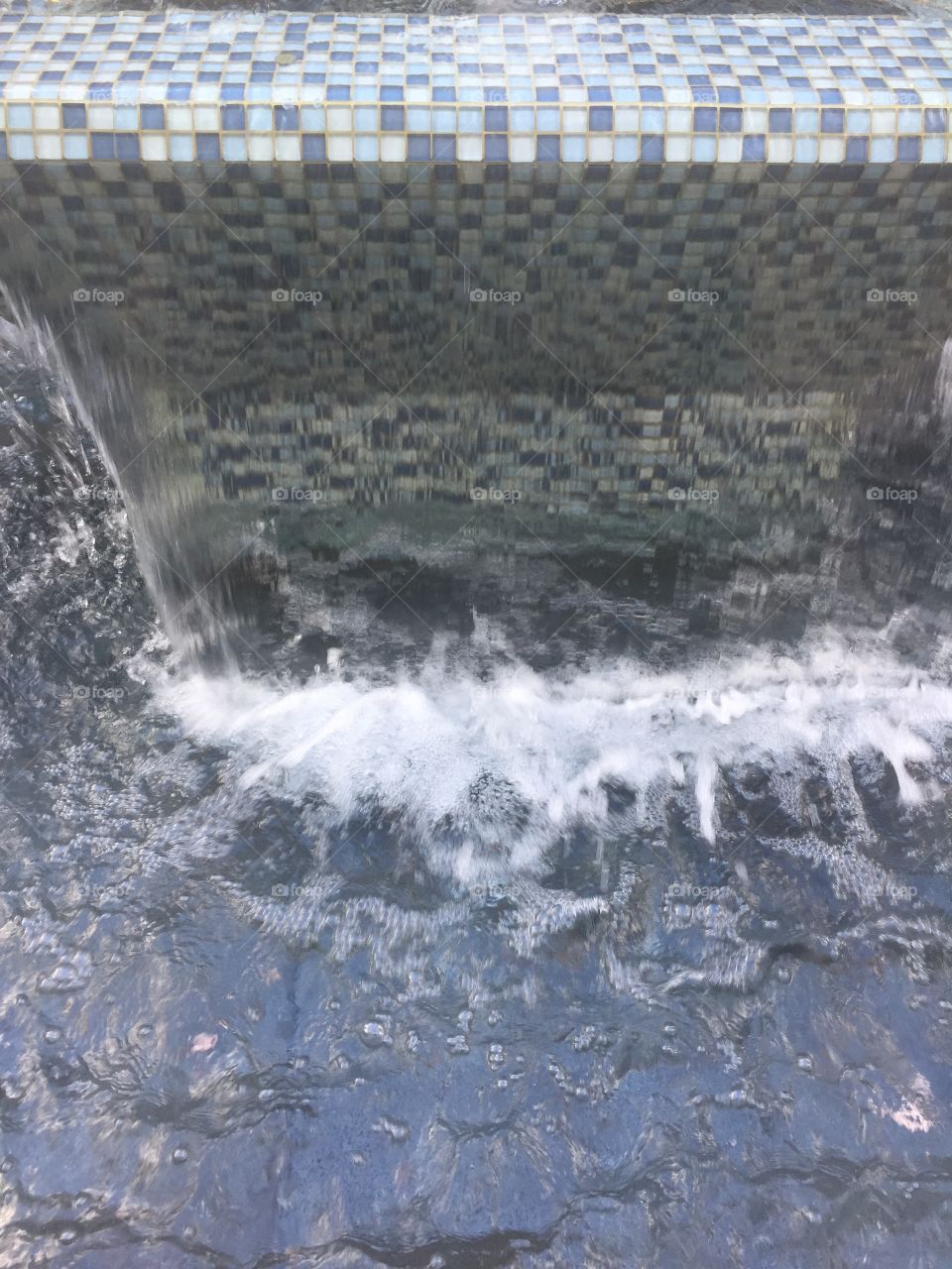 water cascading in fountain