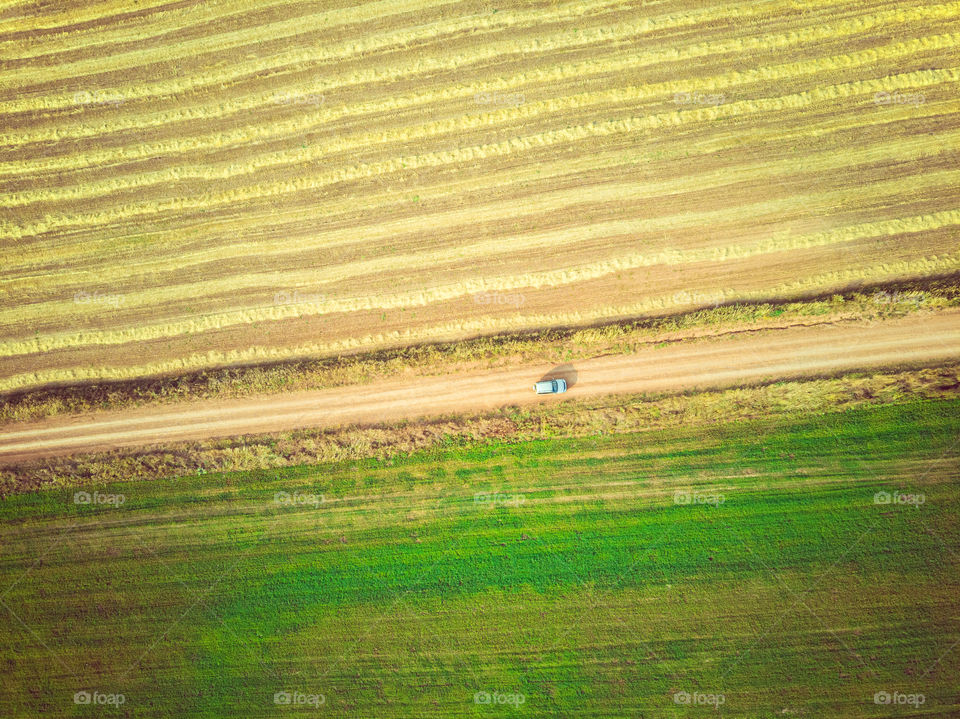 Aerial view of countryside landscape with road and fields