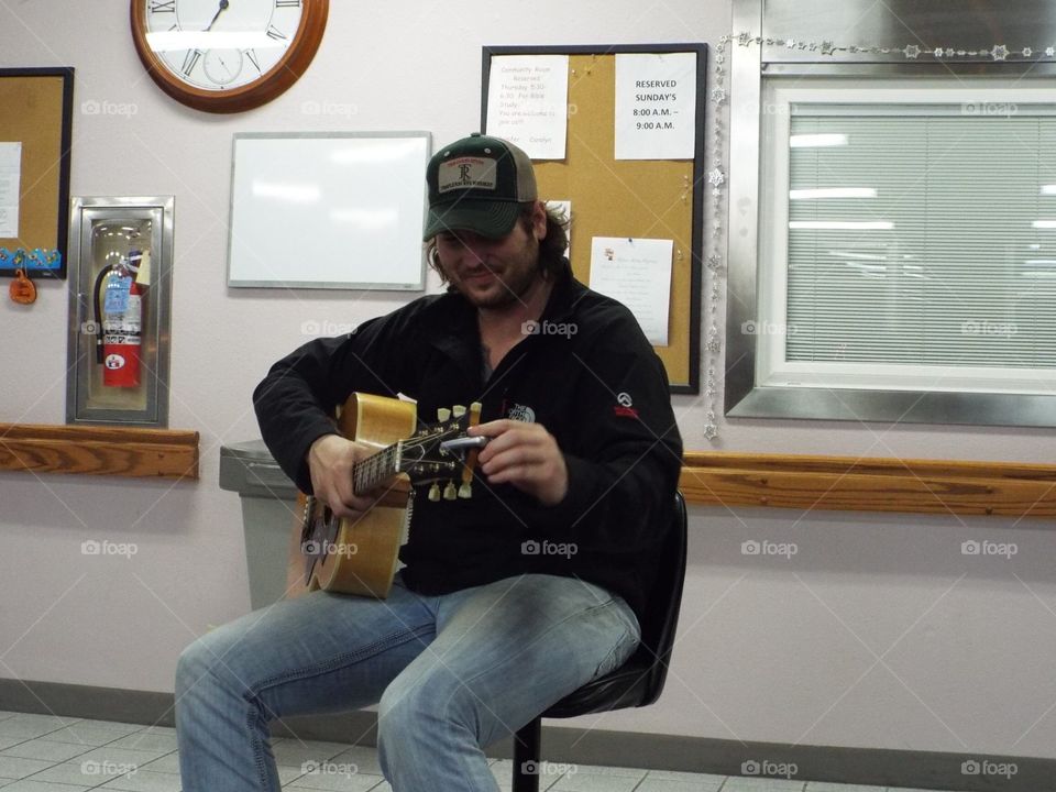 Jake Mcvey playing guitar 