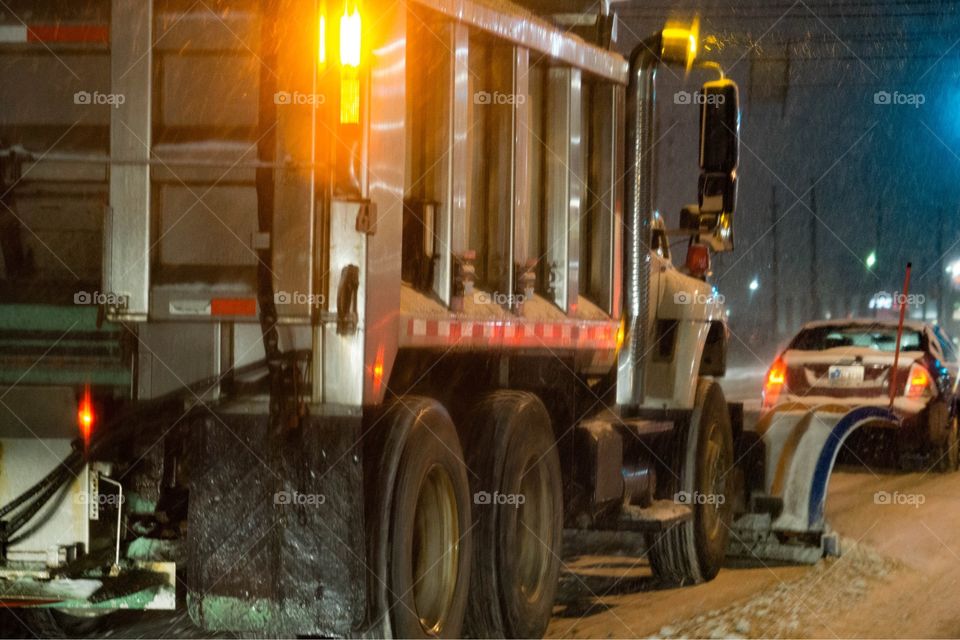 Truck Clearing Snowy Road