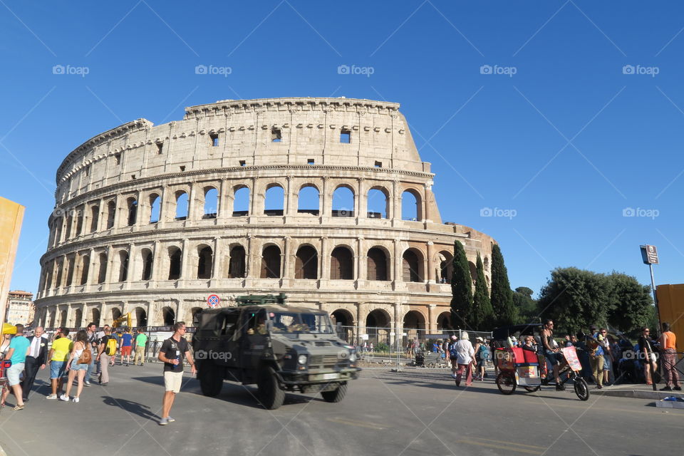 Rome, Italy summer 2016. Military car patrols outside Colosseum. Operazione Strade Sicure (Safe Streets) is the military program to ensure street safety.