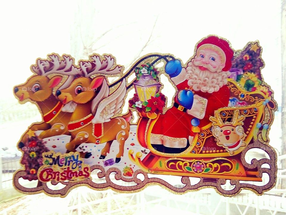 Rain deer and Santa Claus sticker