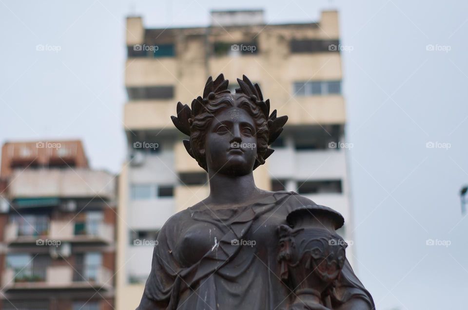 Statue with a steady gaze on a cloudy day